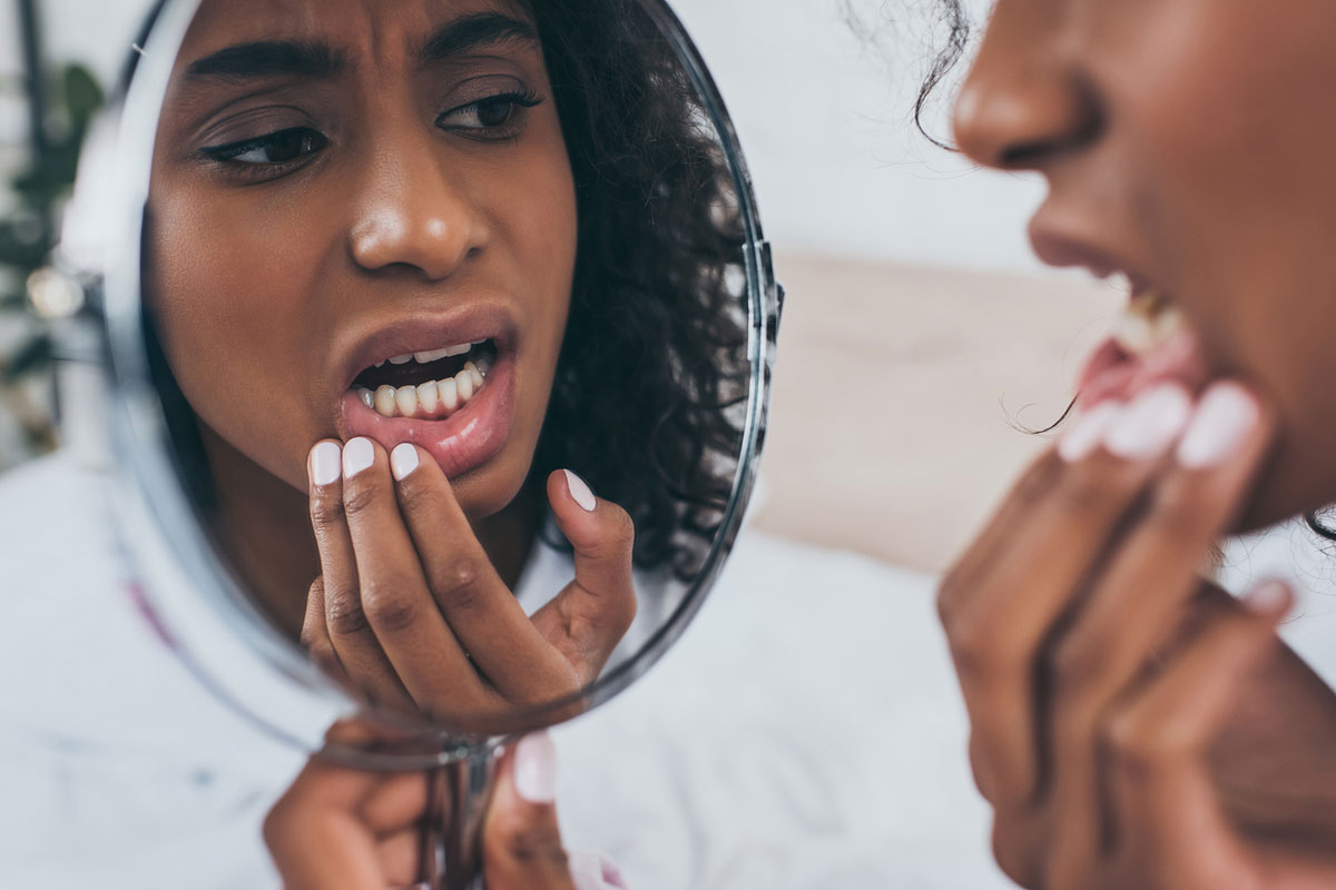 woman needing emergency dental care