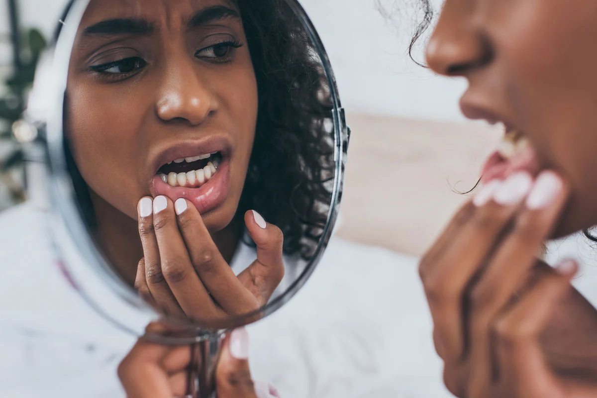 woman needing emergency dental care