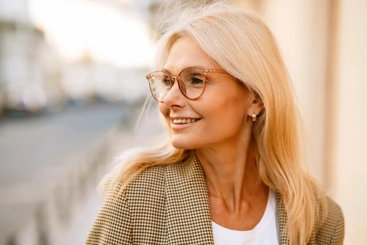 woman smiling after visiting Gateway Oaks Dental - dental office in Sacramento, CA