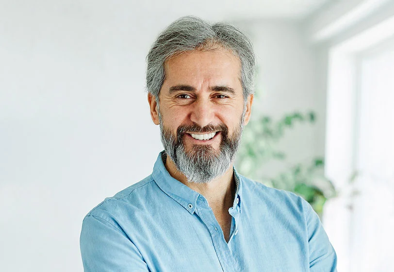 man showing off his freshly cleaned smile thanks to Gateway Oaks Dental in Sacramento, CA