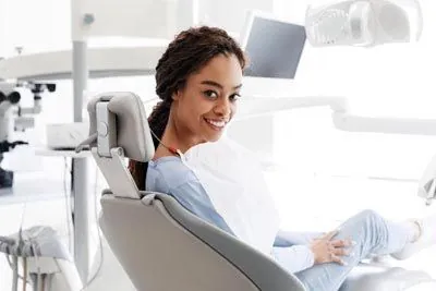 woman getting dental care at Gateway Oaks Dental