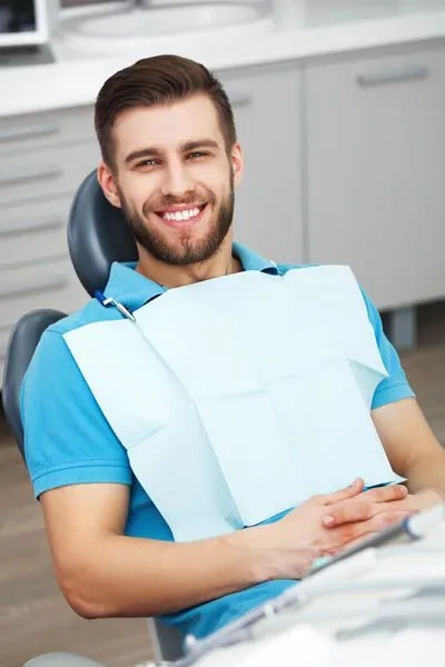 man loving his smile makeover from Gateway Oaks Dental